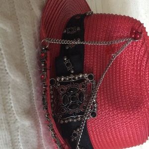 Red jeweled hat from Venice Italy